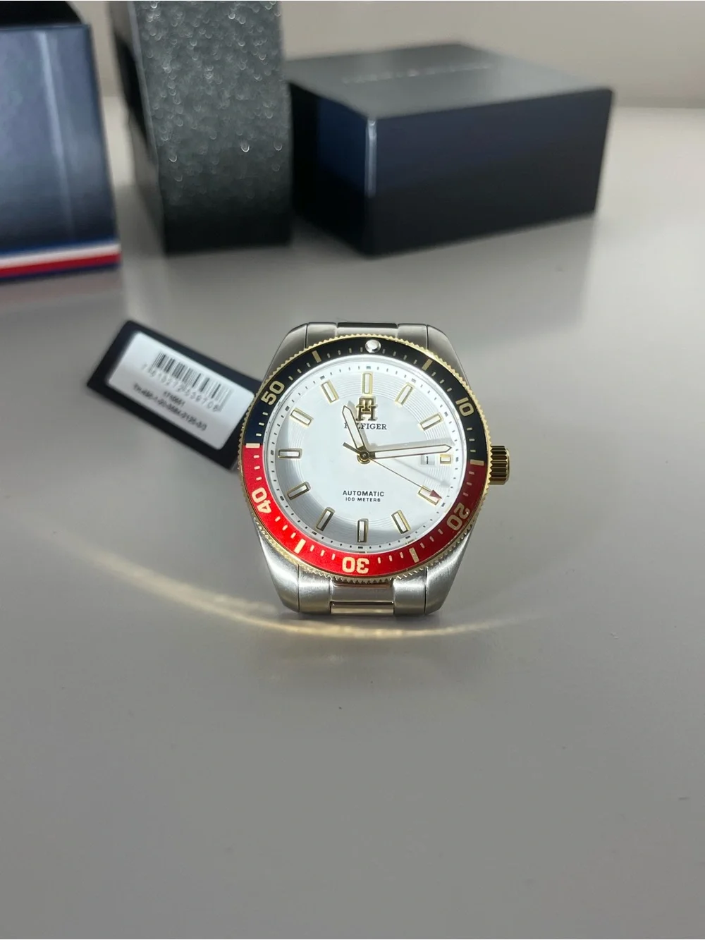 Tommy Hilfiger Silver Dial Men’s Watch with Red and Black Bezel